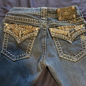 Women’s designer jeans Miss Me.